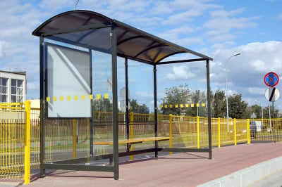 Topaz bus shelter with steel frame and polycarbonate panels, seating and an advertising case