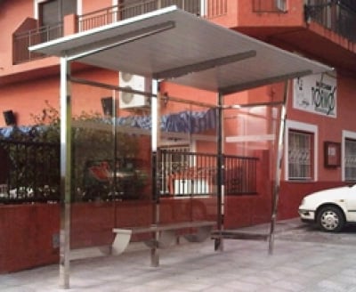 Stainless steel bus shelter with seating